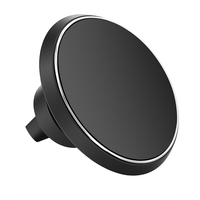 Black magnetic wireless car charger and phone mount with a silver ring and vent clip